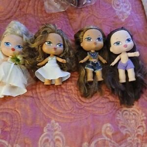 Set of Four Fashion Dolls with Outfits